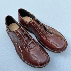 Shoes from Clarks of England in a size 6 1/2, brown, never worn.